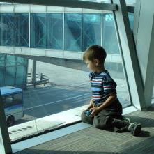 Boy Waiting to Travel