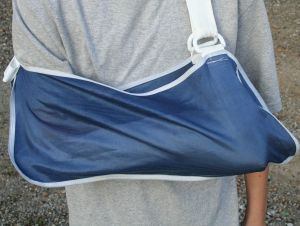 Broken Arm in a sling - still cheaper for American doctors to handle it