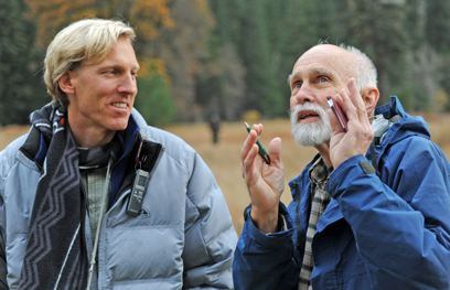 Climbers Hans Florine, left, and George Whitmore, right discuss climbing