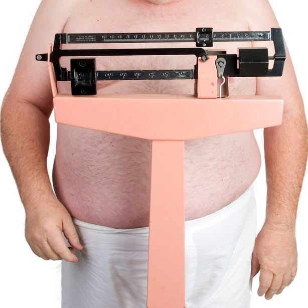 Weighing man at the scale