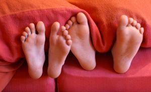 Little feet in bed