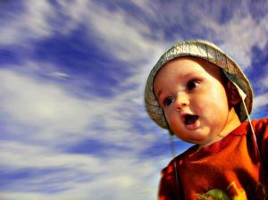 Toddler with sky background