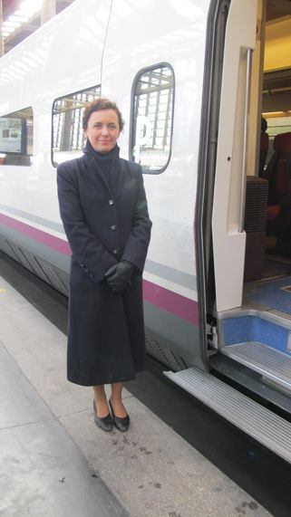 Irvina Lew outside a train in Seville, Spain