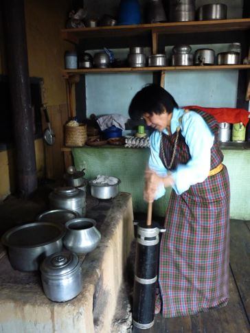Bhutanese Woman Making Butter Tea