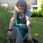Sue Coppard of WWOOF working in a garden - photo courtesy WWOOF
