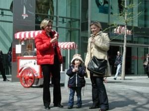 Moms & Kid Enjoy Sweets In Berlin
